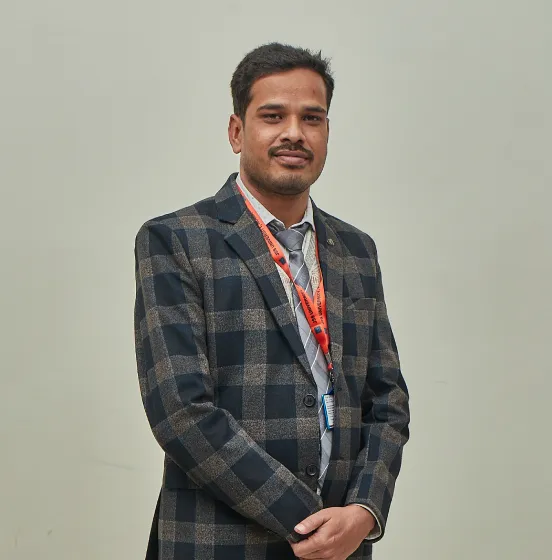 Dr. Suresha .B