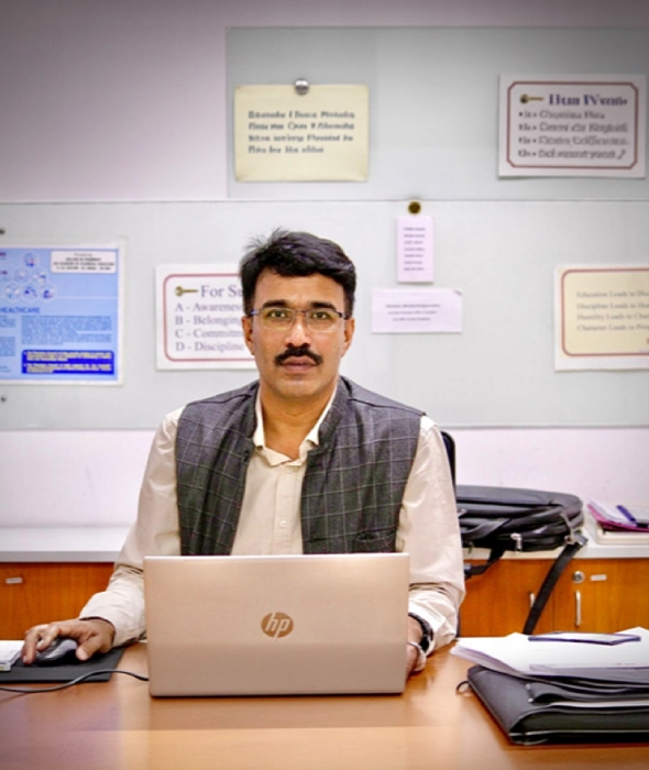 Dr. Praveen TK